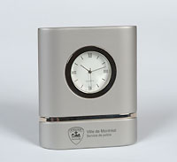 Silver colored SPVM Quartz clock.